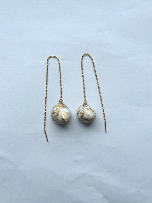 Øreringe med topsneglehuse